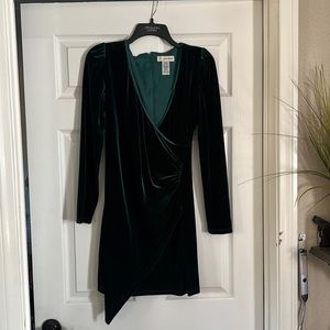 emerald green velvety long sleeve with side slit. Size M